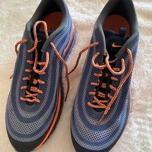 Men’s Nike Air tennis shoes.